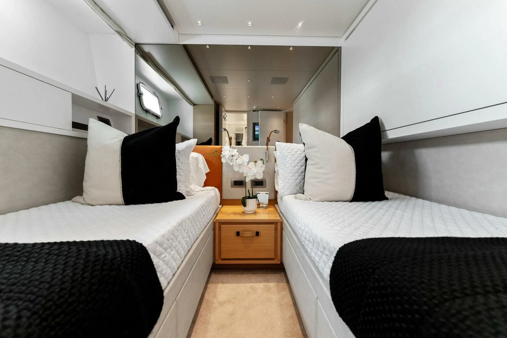 a room with two beds aboard GATSBY Yacht for Charter