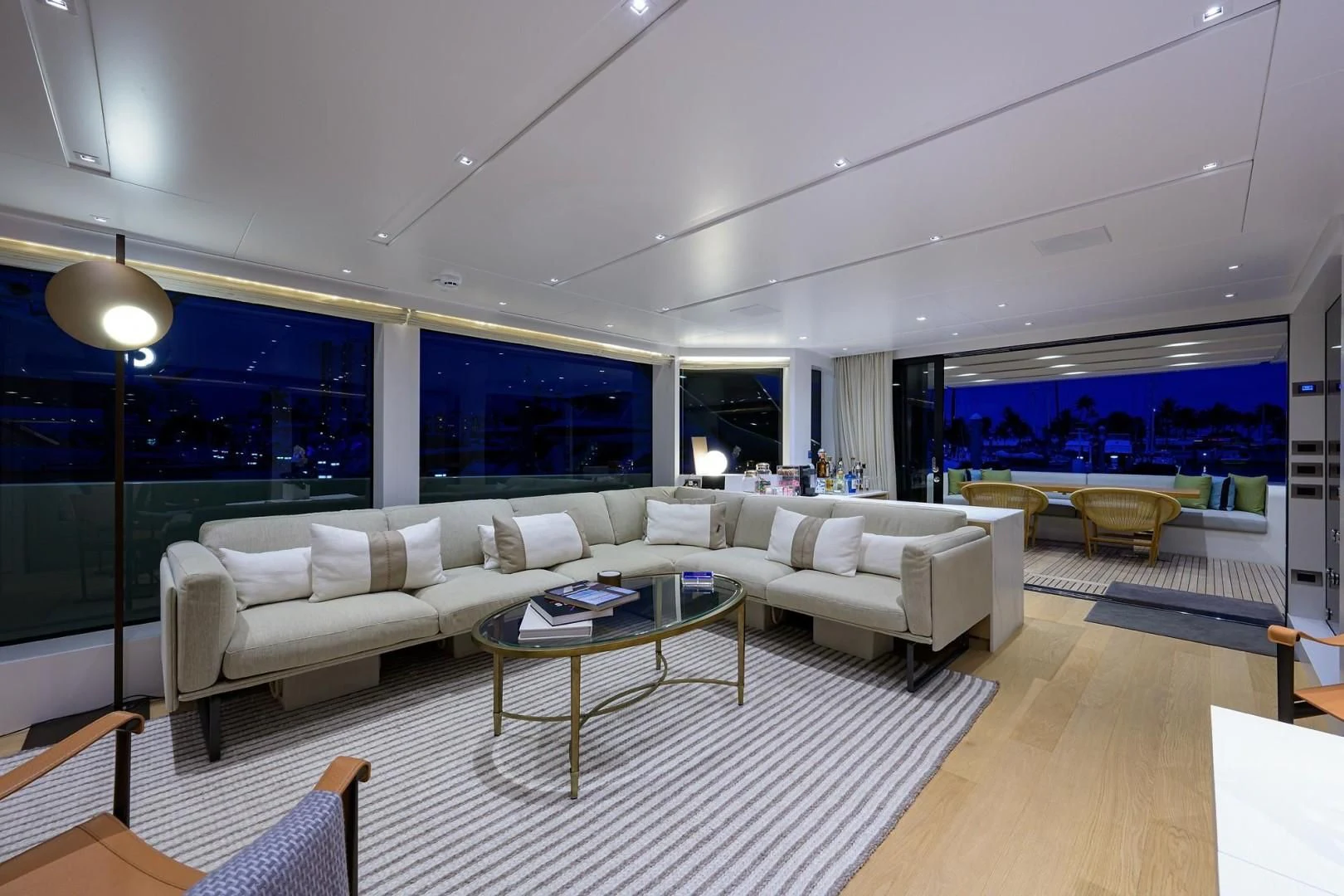 a living room with a large window aboard GATSBY Yacht for Charter