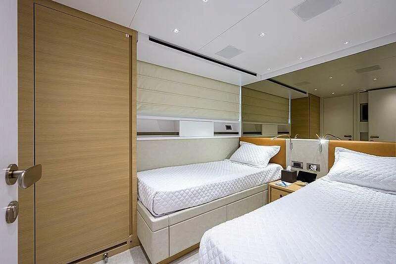 a room with two beds aboard GATSBY Yacht for Charter