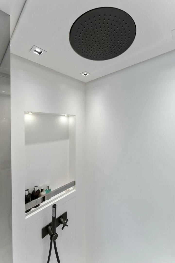 a mirror hangs from a wall aboard GATSBY Yacht for Charter