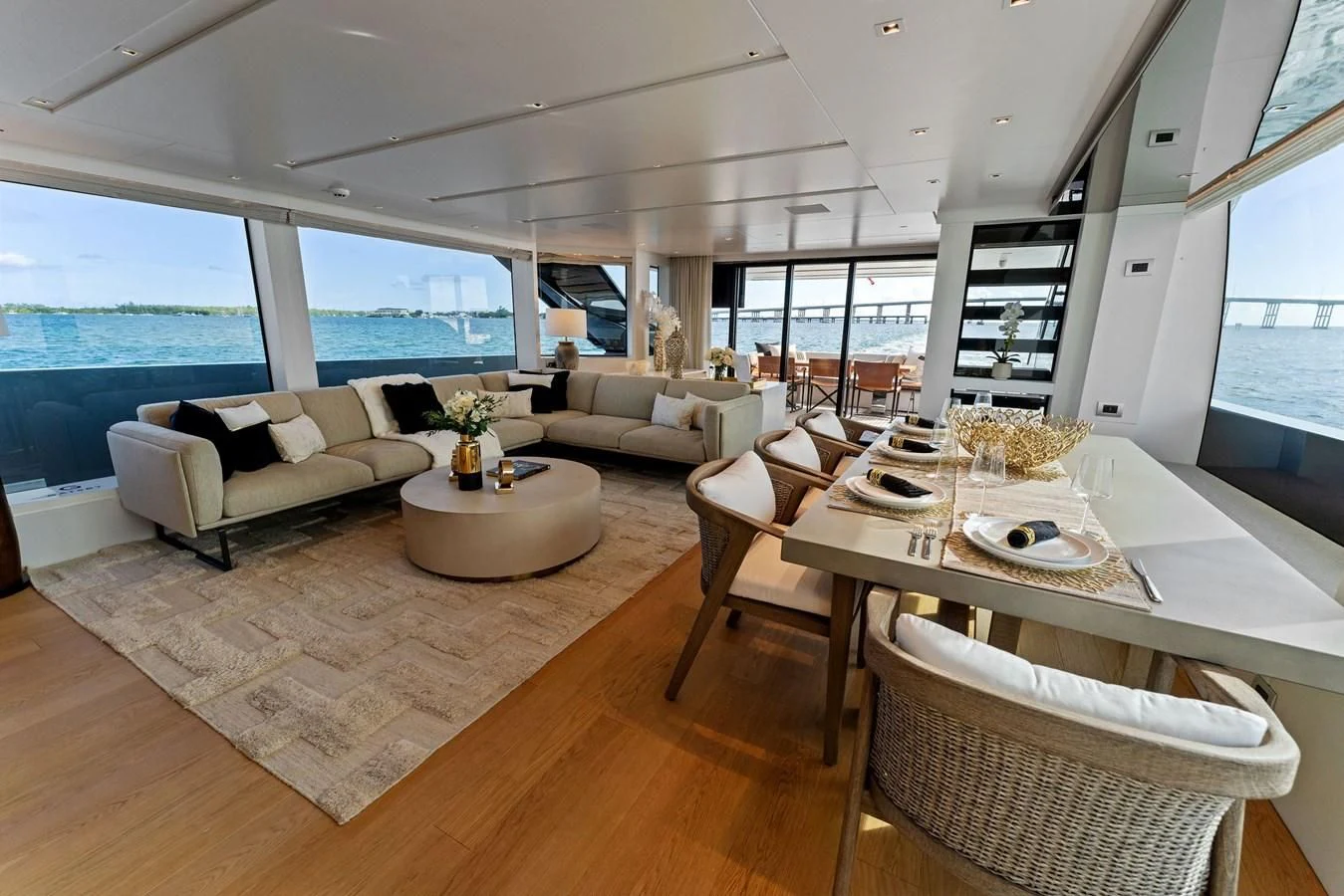 a living room with a large window aboard GATSBY Yacht for Charter