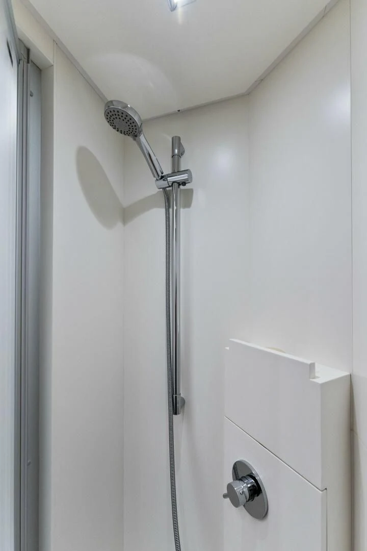 a shower with a glass door aboard GATSBY Yacht for Charter