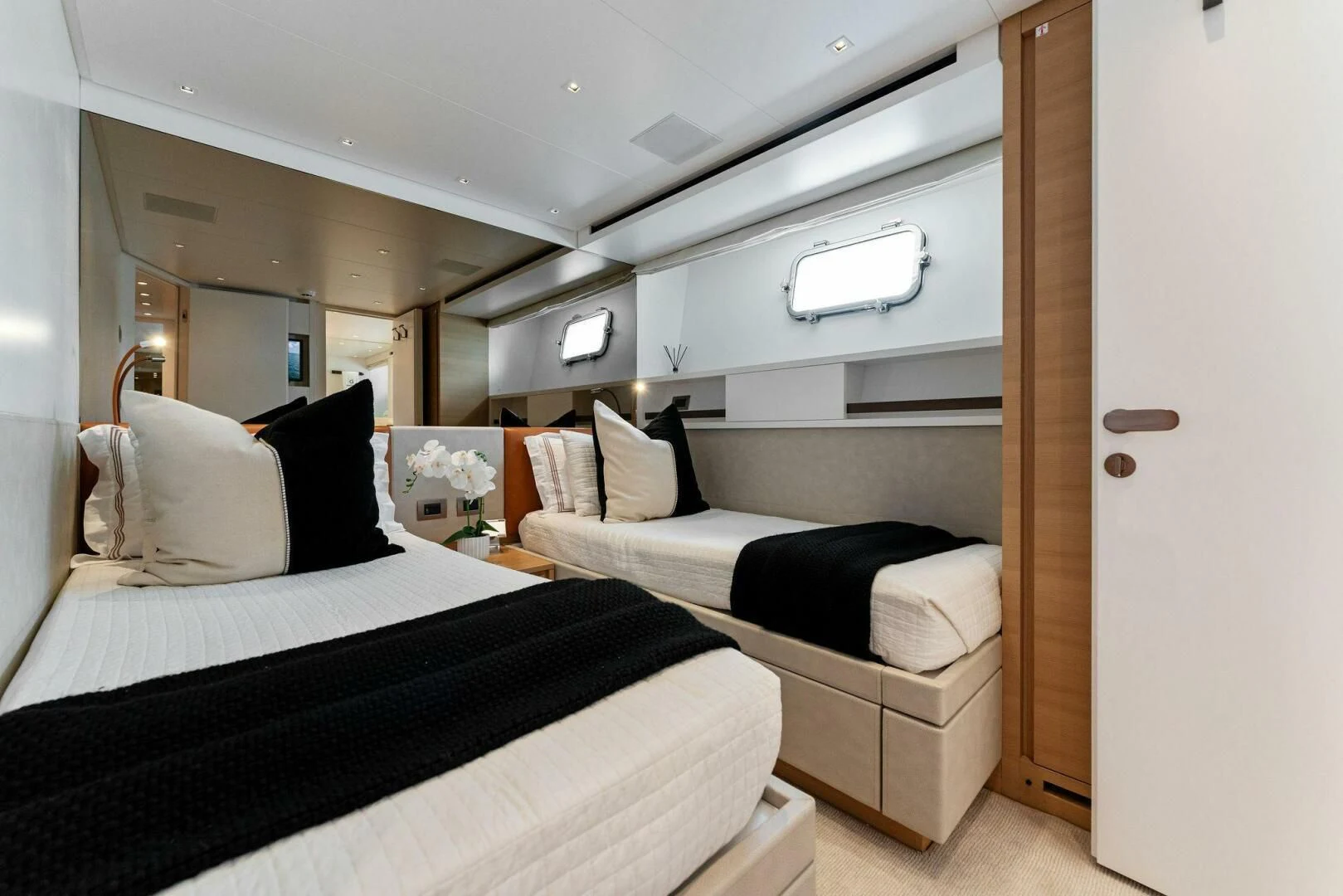 a room with two beds aboard GATSBY Yacht for Charter