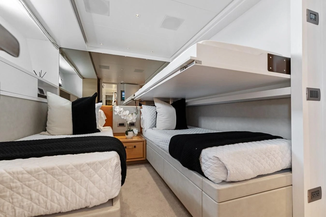a room with two beds aboard GATSBY Yacht for Charter