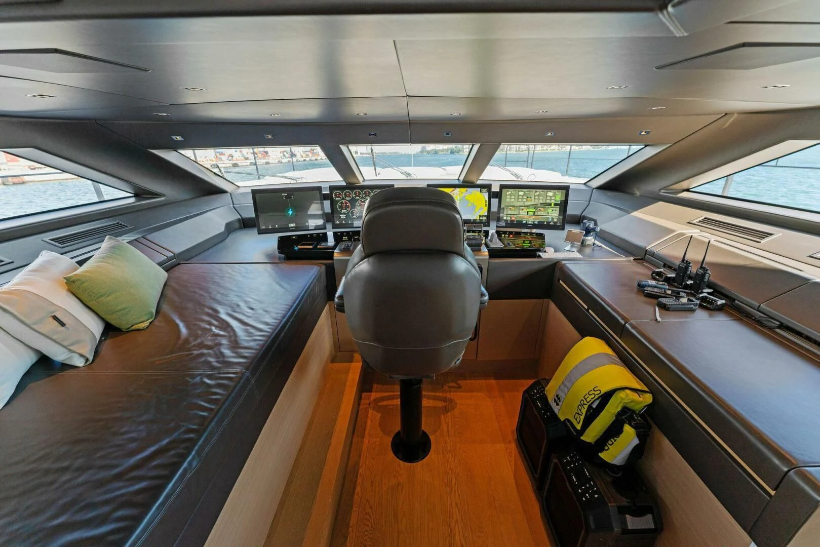a room with a desk and chairs aboard GATSBY Yacht for Charter