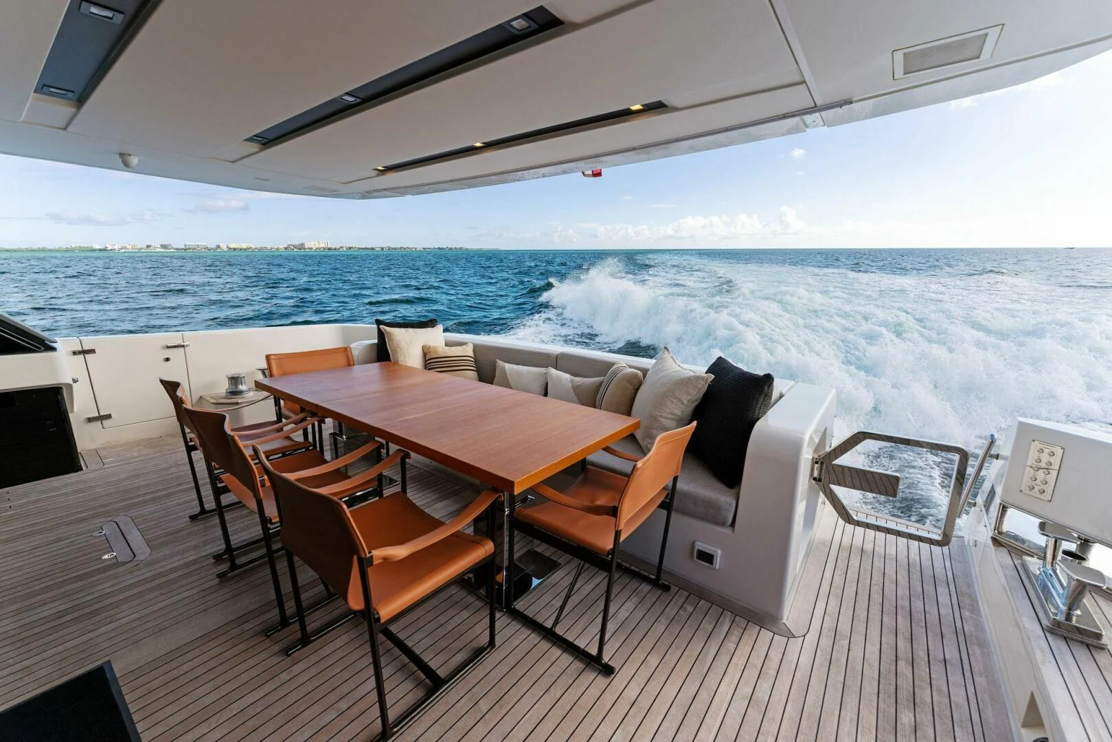 a room with a table and chairs aboard GATSBY Yacht for Charter
