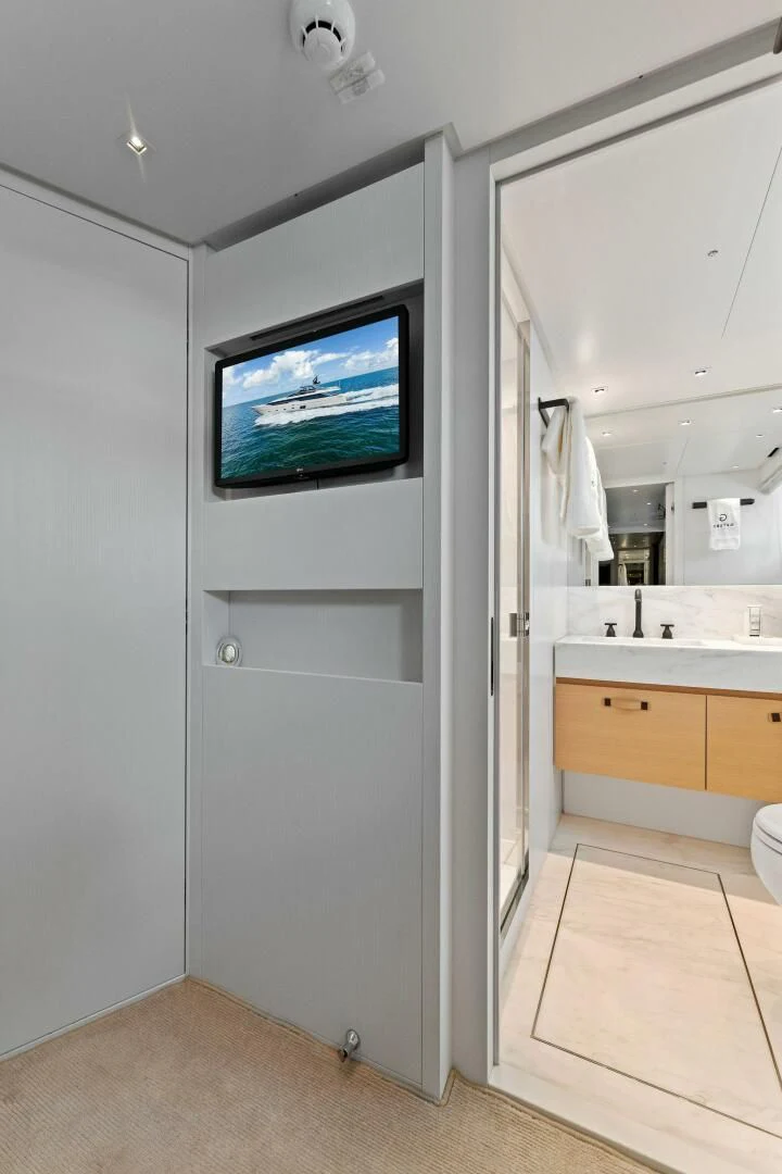 a bathroom with a large mirror aboard GATSBY Yacht for Charter