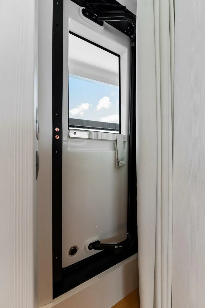 a machine in a room aboard GATSBY Yacht for Charter