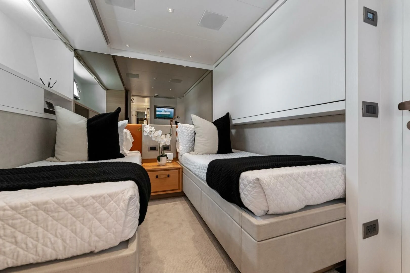 a room with two beds aboard GATSBY Yacht for Charter