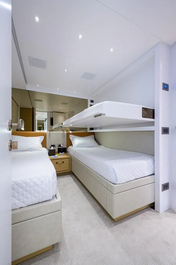 a room with two beds aboard GATSBY Yacht for Charter