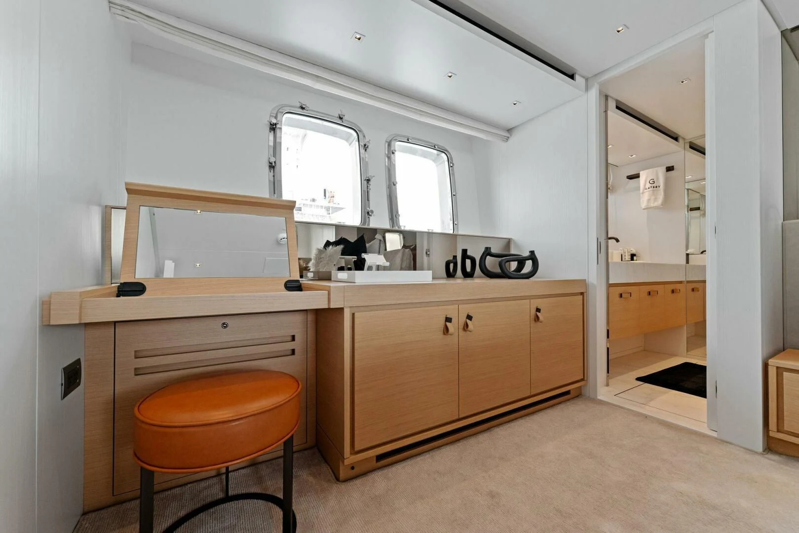 a kitchen with a stool and a stool aboard GATSBY Yacht for Charter