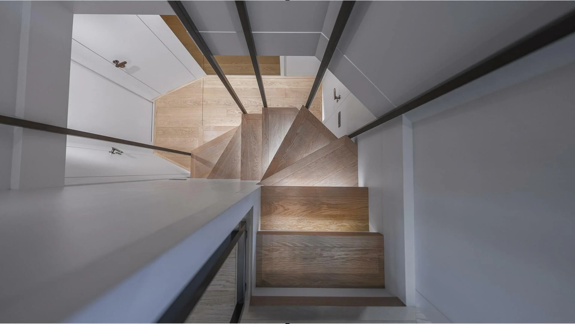 a set of wooden stairs aboard GATSBY Yacht for Charter