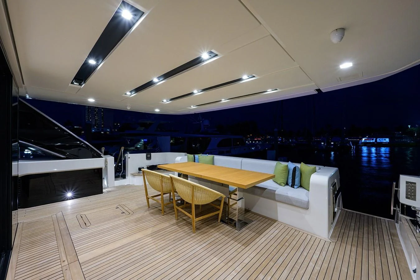 a room with a table and chairs aboard GATSBY Yacht for Charter