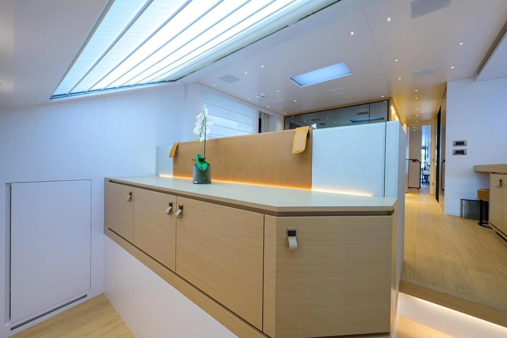 a room with cabinets and a ceiling fan aboard GATSBY Yacht for Charter