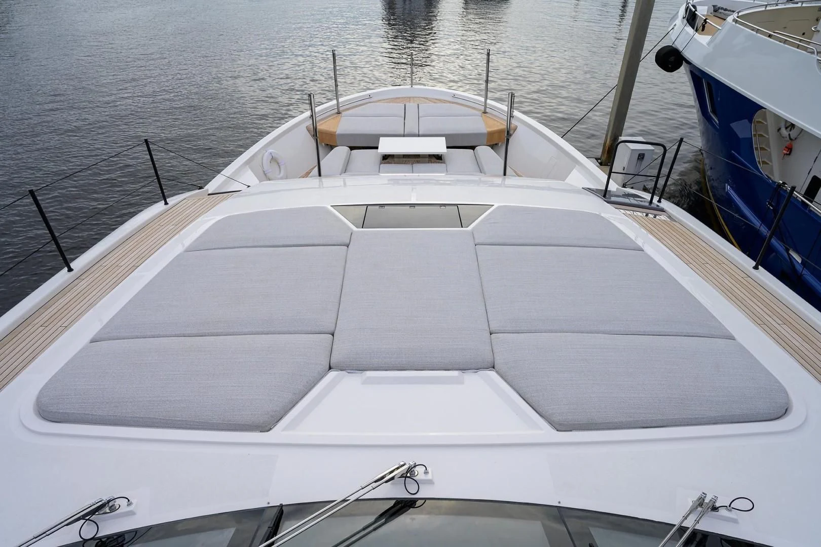 a white boat on the water aboard GATSBY Yacht for Charter