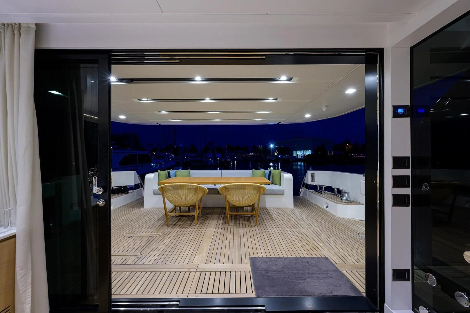 a room with a table and chairs aboard GATSBY Yacht for Charter