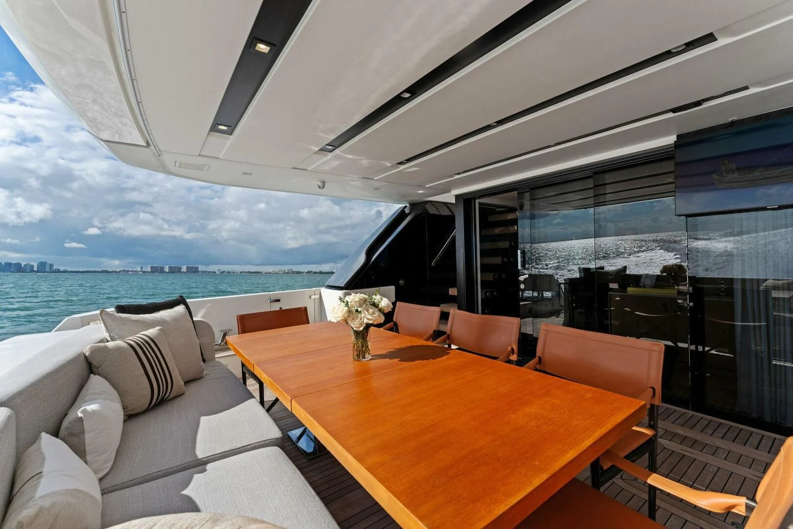 a room with a table and chairs aboard GATSBY Yacht for Charter