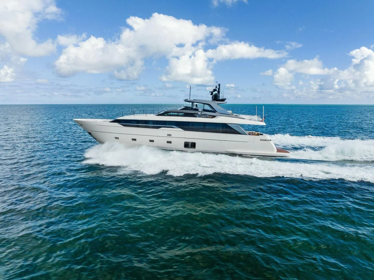 a white yacht in the water aboard GATSBY Yacht for Charter