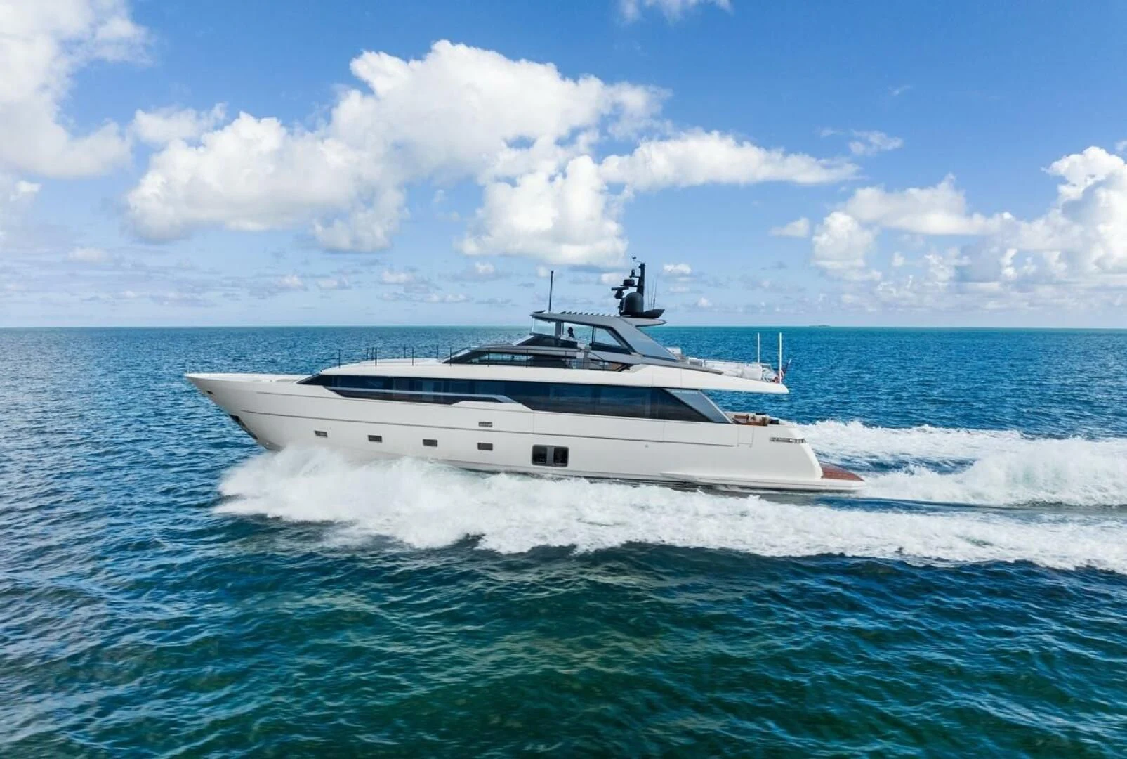 a white yacht in the water aboard GATSBY Yacht for Charter