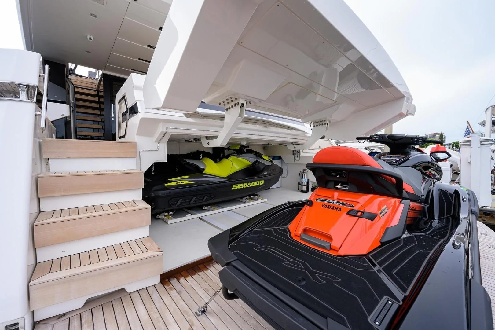 a group of race cars on a race track aboard GATSBY Yacht for Charter