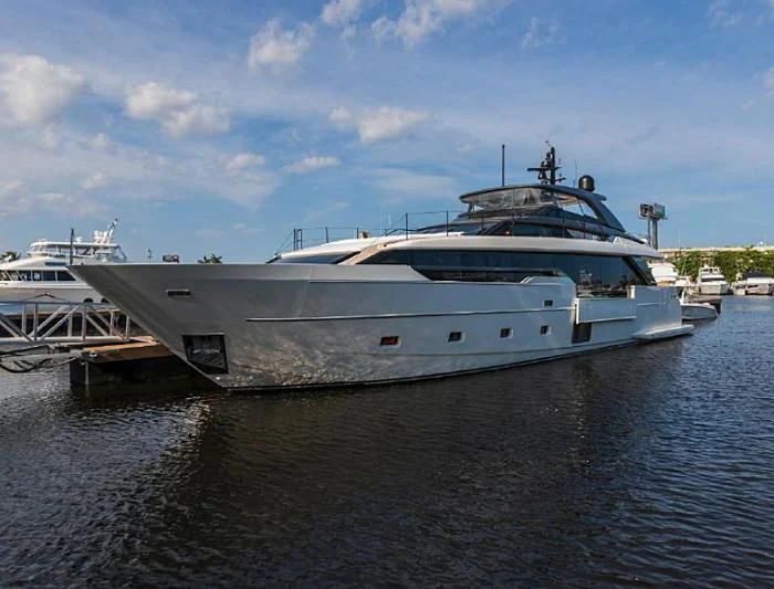 a large white boat in a harbor aboard GATSBY Yacht for Charter
