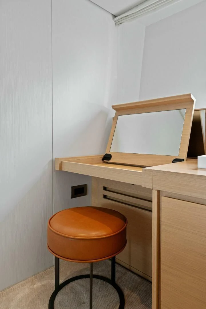 a stool in front of a desk aboard GATSBY Yacht for Charter