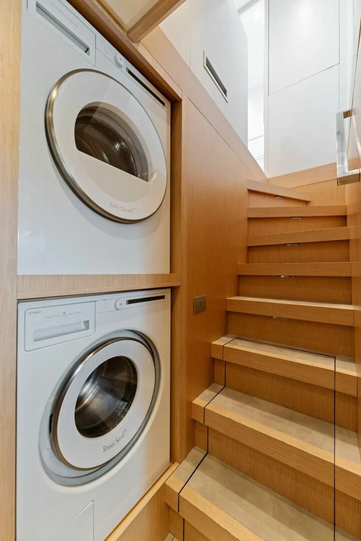 a white washing machine aboard GATSBY Yacht for Charter