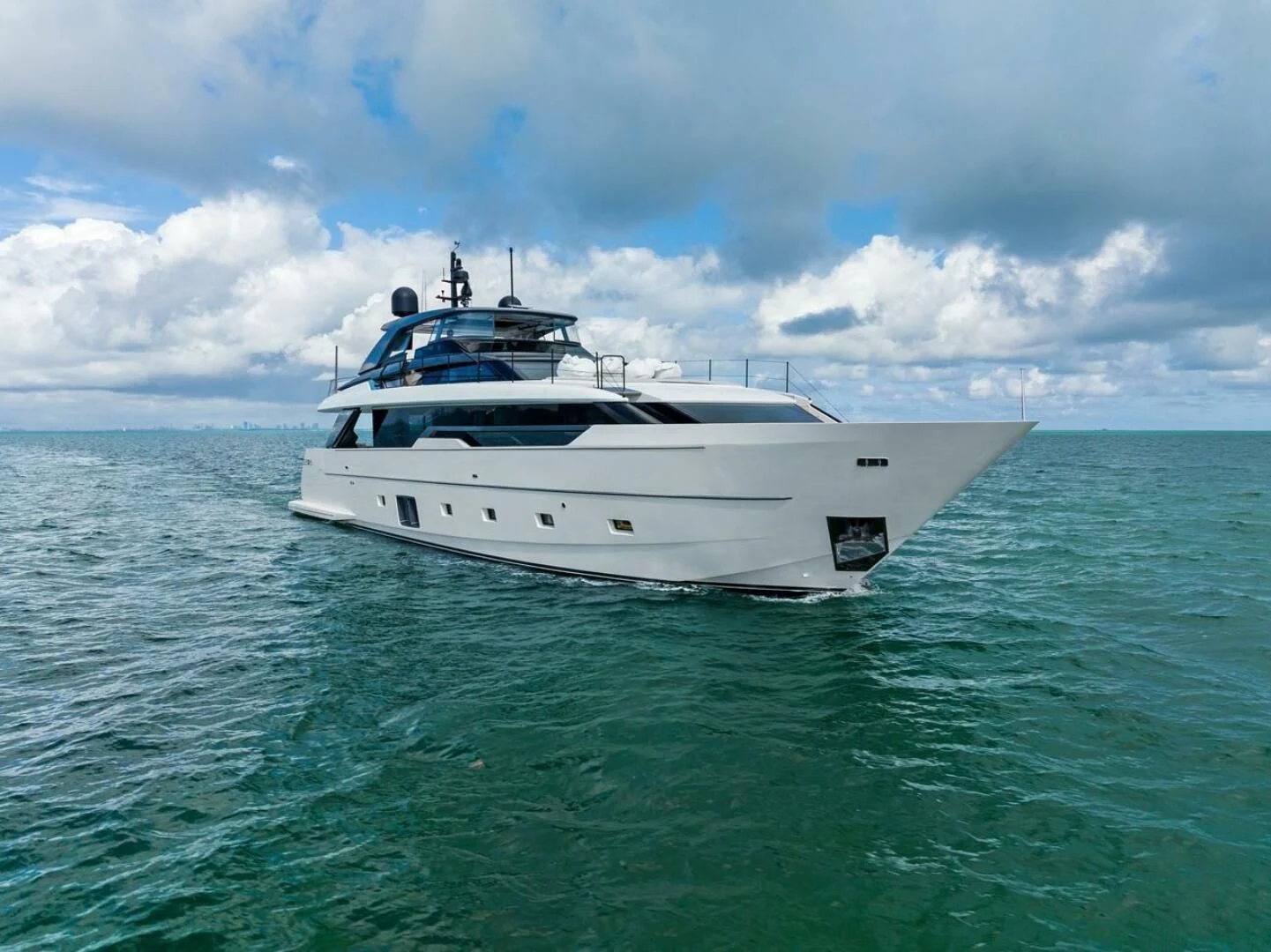a white boat in the water aboard GATSBY Yacht for Charter