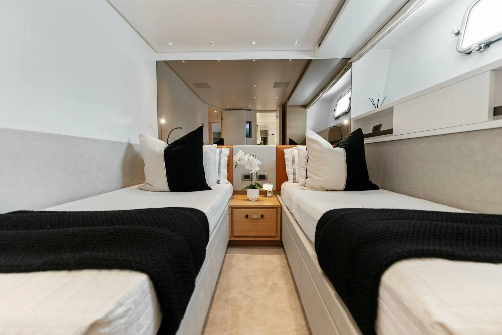a room with two beds aboard GATSBY Yacht for Charter