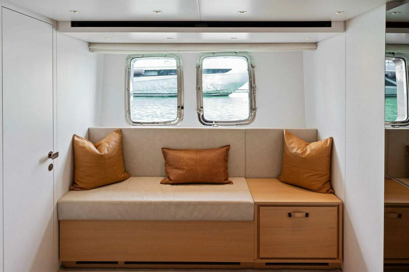 a couch in a room aboard GATSBY Yacht for Charter