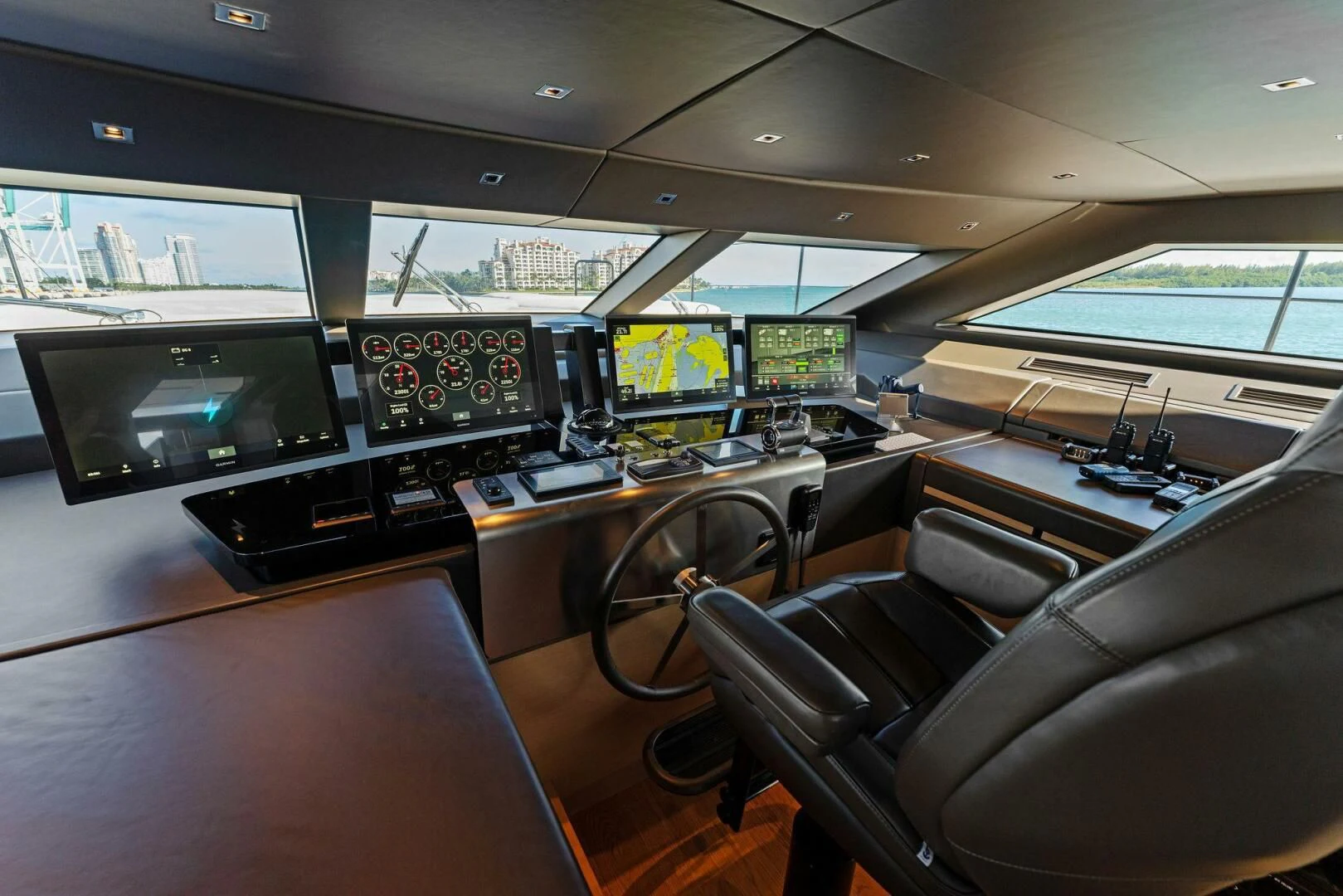 inside of a vehicle with monitors and screens aboard GATSBY Yacht for Charter