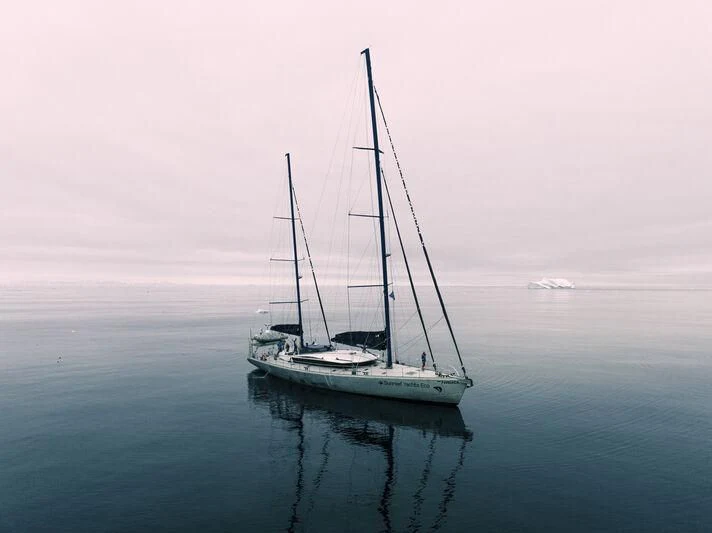 a sailboat in the water aboard PANGAEA Yacht for Sale