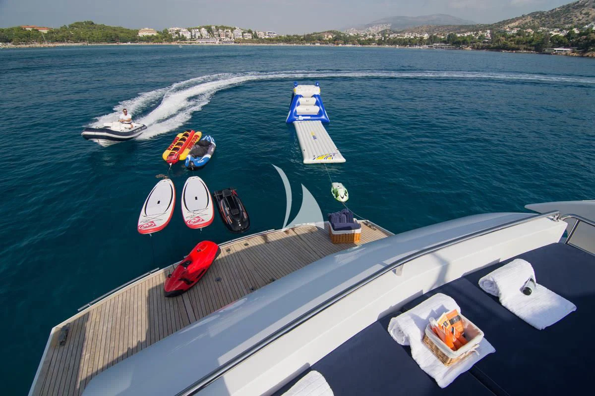 a group of boats on a body of water aboard MAC Yacht for Sale