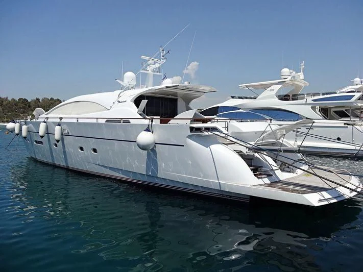 a couple of white yachts in the water aboard MAC Yacht for Sale