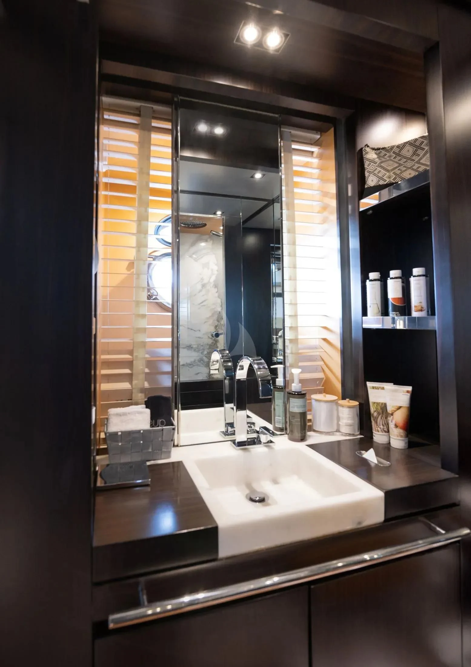 a bathroom with a large mirror aboard MAC Yacht for Sale