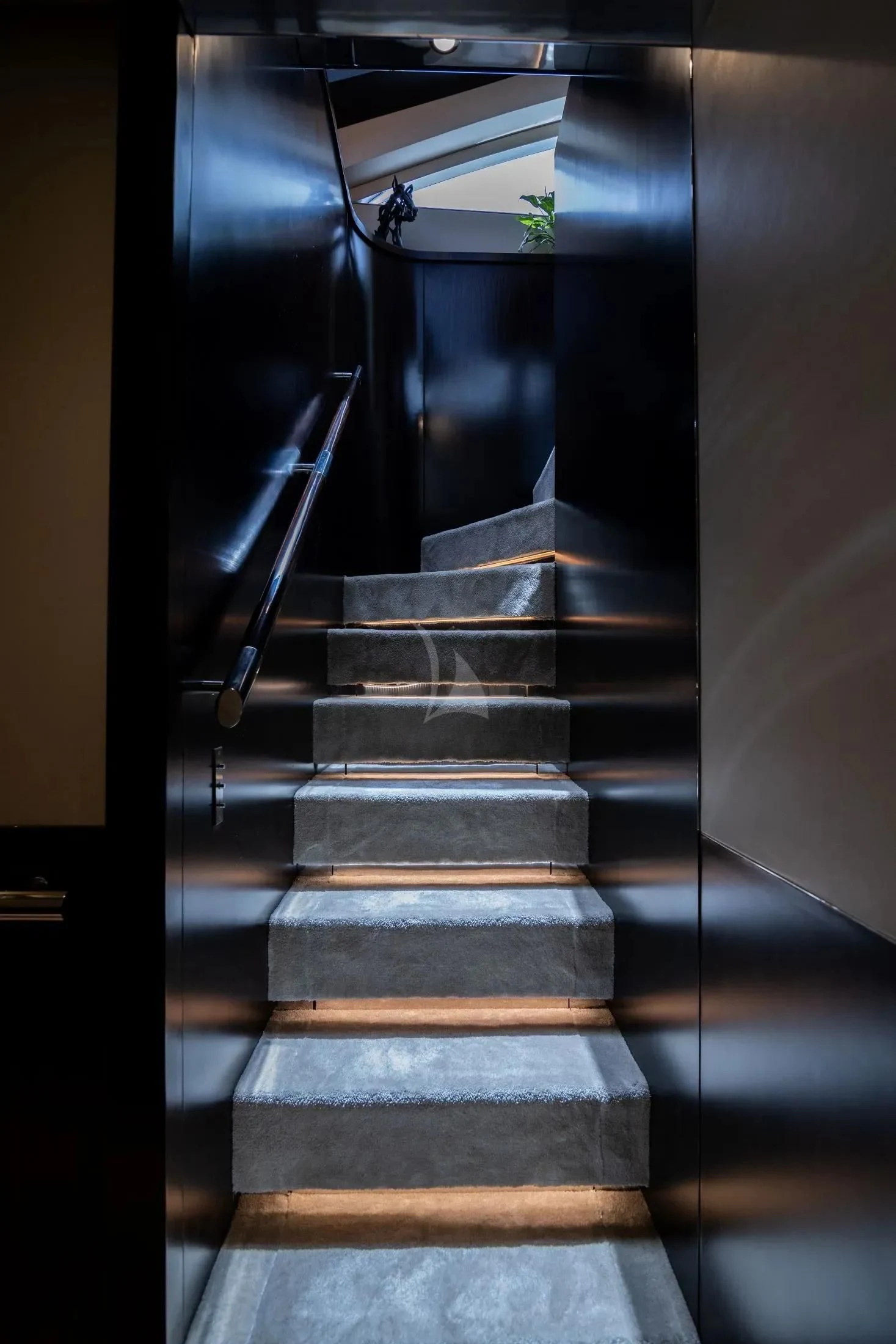 a set of stairs in a building aboard MAC Yacht for Sale