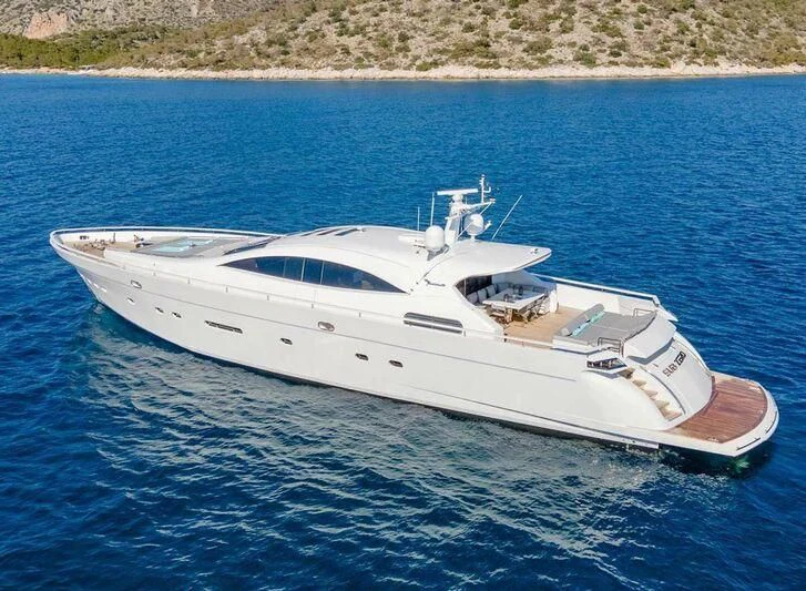 a white yacht in the water aboard MAC Yacht for Sale