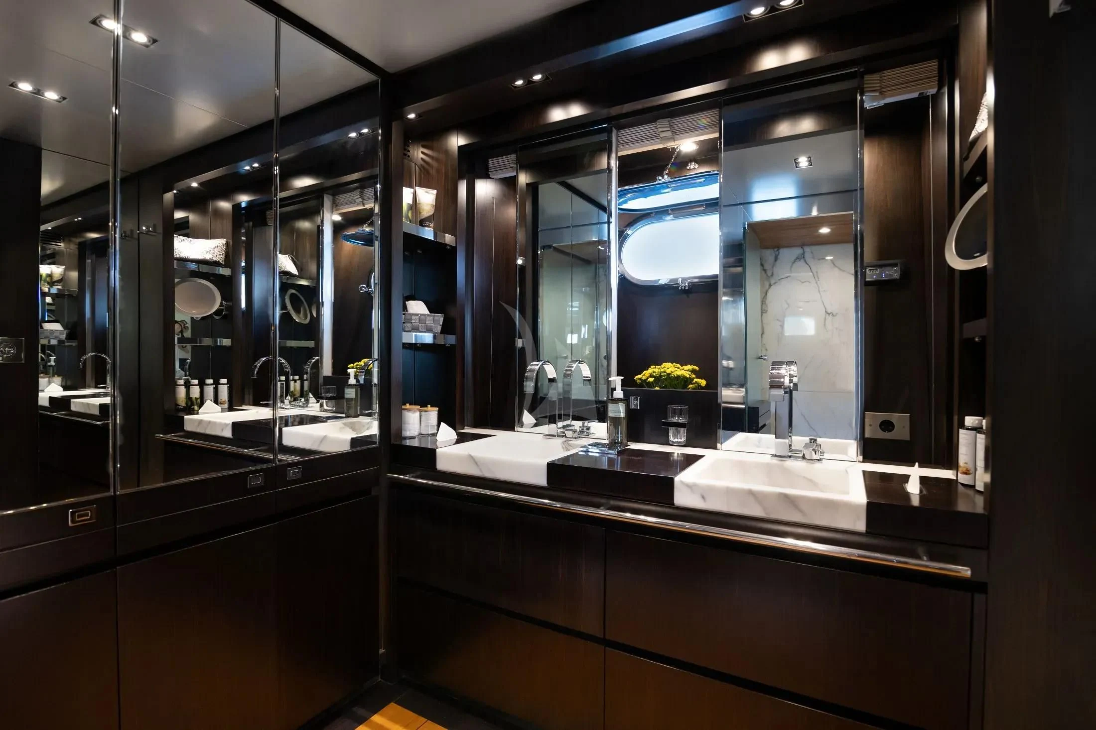 a bathroom with a large mirror aboard MAC Yacht for Sale