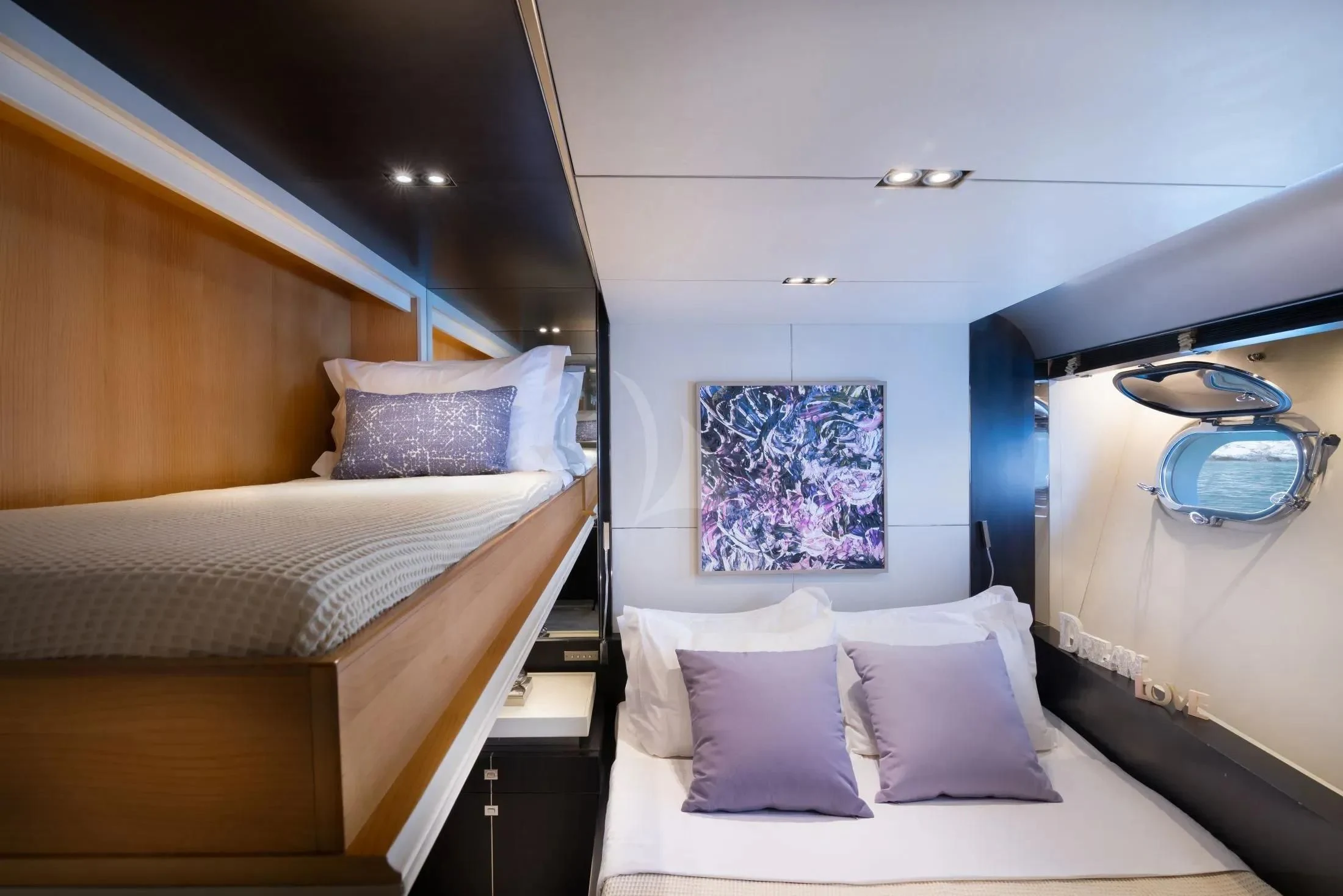 a room with two beds aboard MAC Yacht for Sale