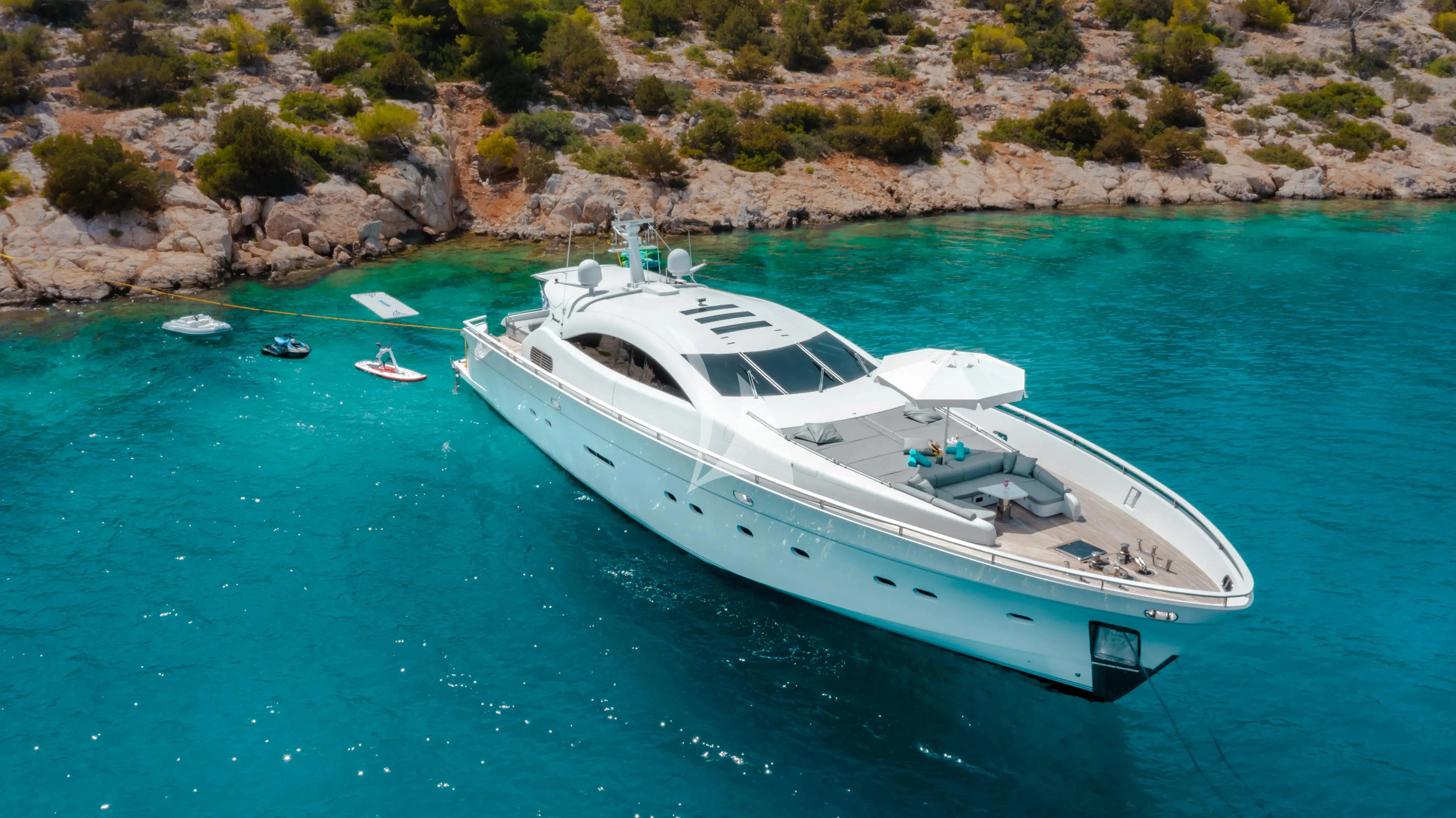 a white boat in the water aboard MAC Yacht for Sale