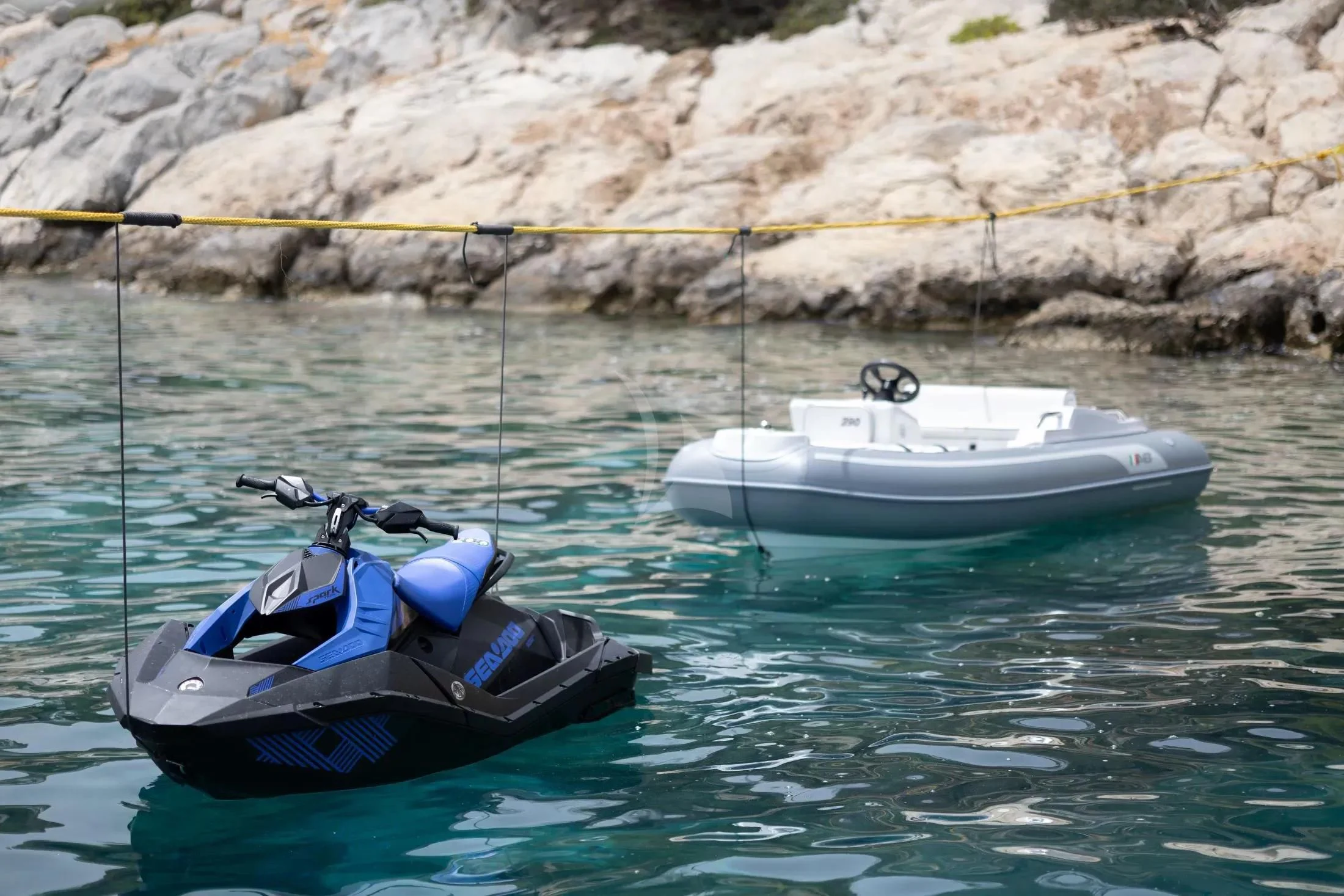 a couple of boats in the water aboard MAC Yacht for Sale