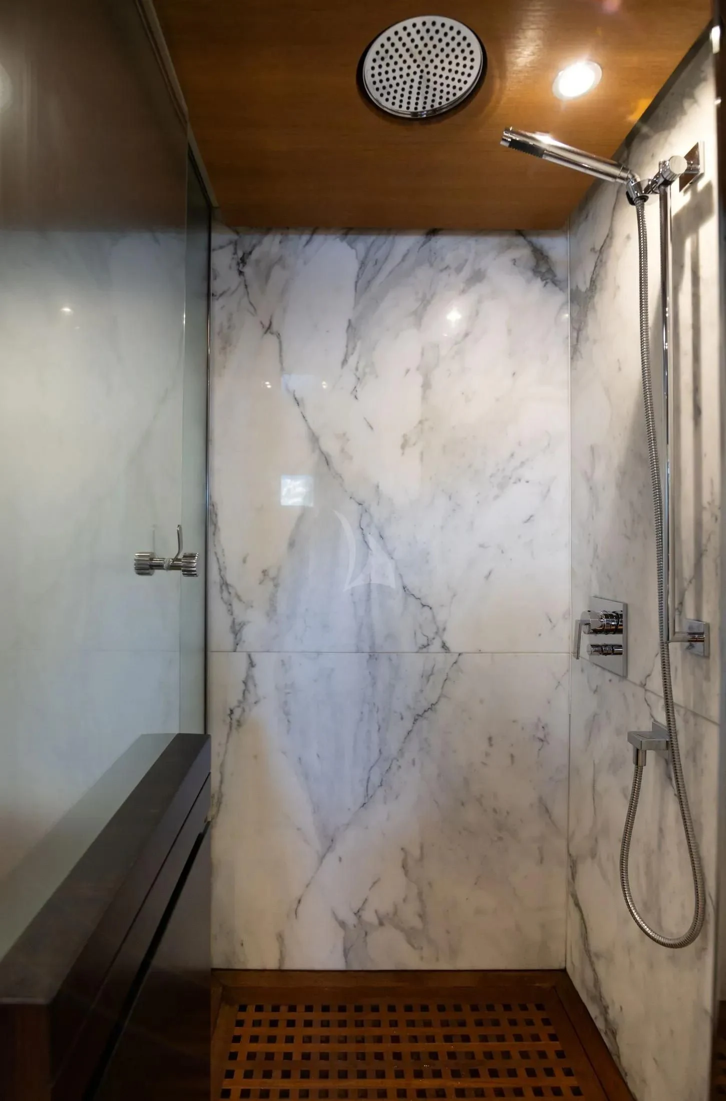a shower with a sink and a shower head aboard MAC Yacht for Sale