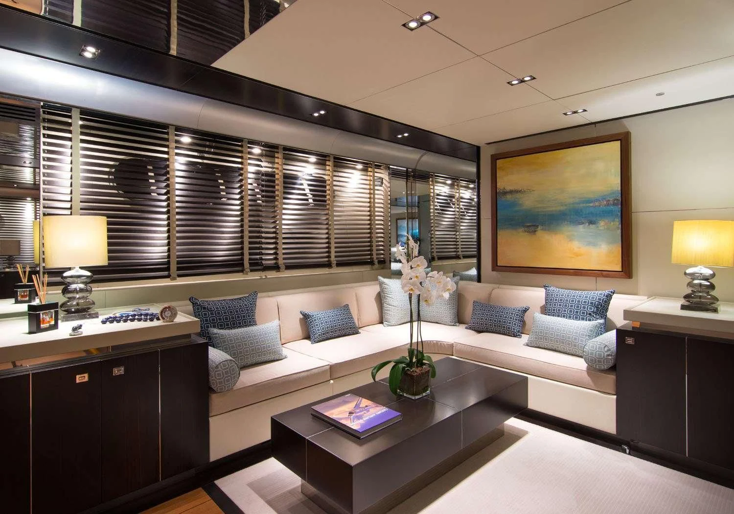 a living room with a large window aboard MAC Yacht for Sale