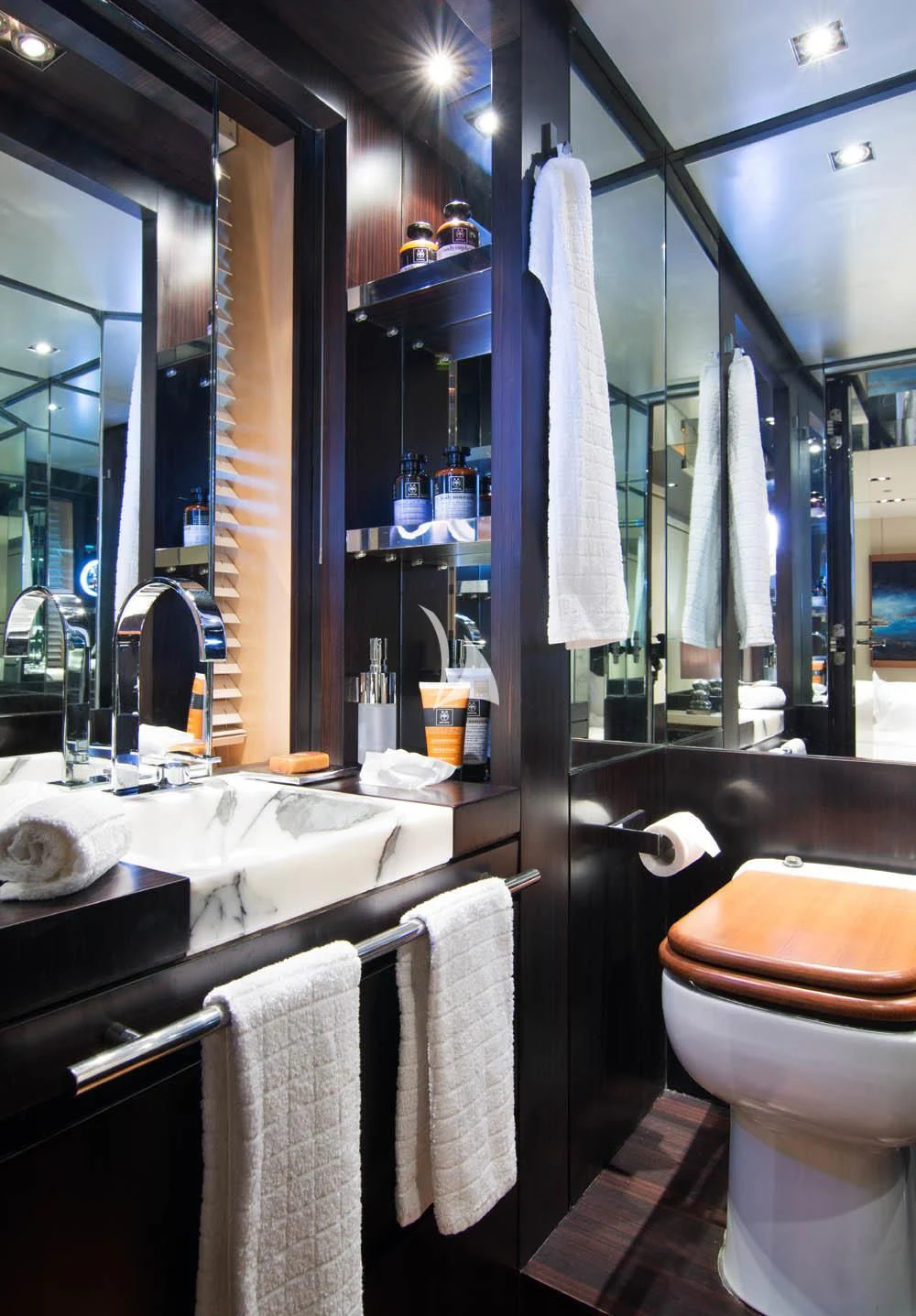 a bathroom with a sink and toilet aboard MAC Yacht for Sale