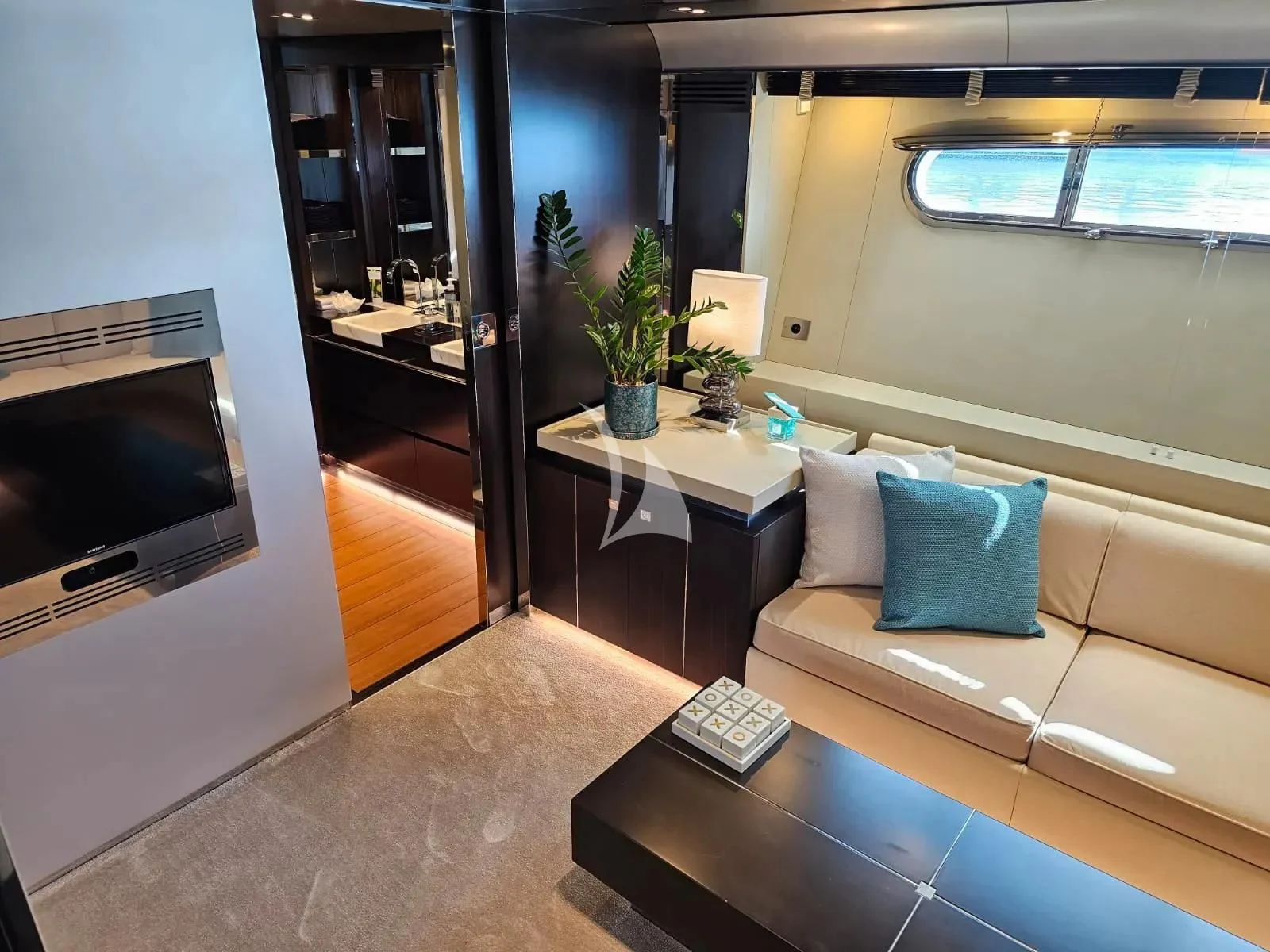 a living room with a couch and a tv aboard MAC Yacht for Sale