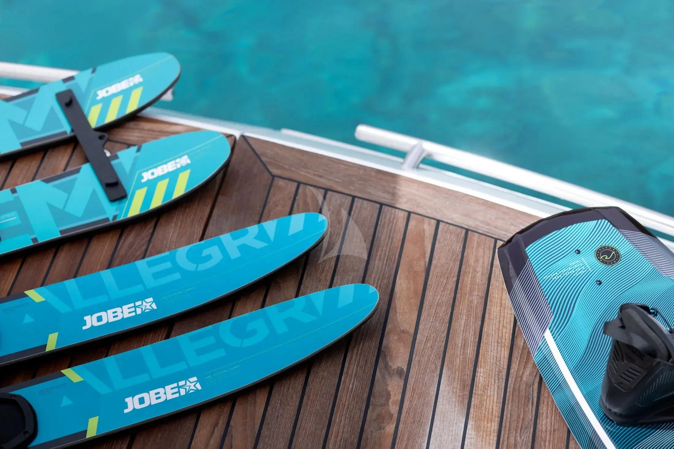 a group of books on a table aboard MAC Yacht for Sale