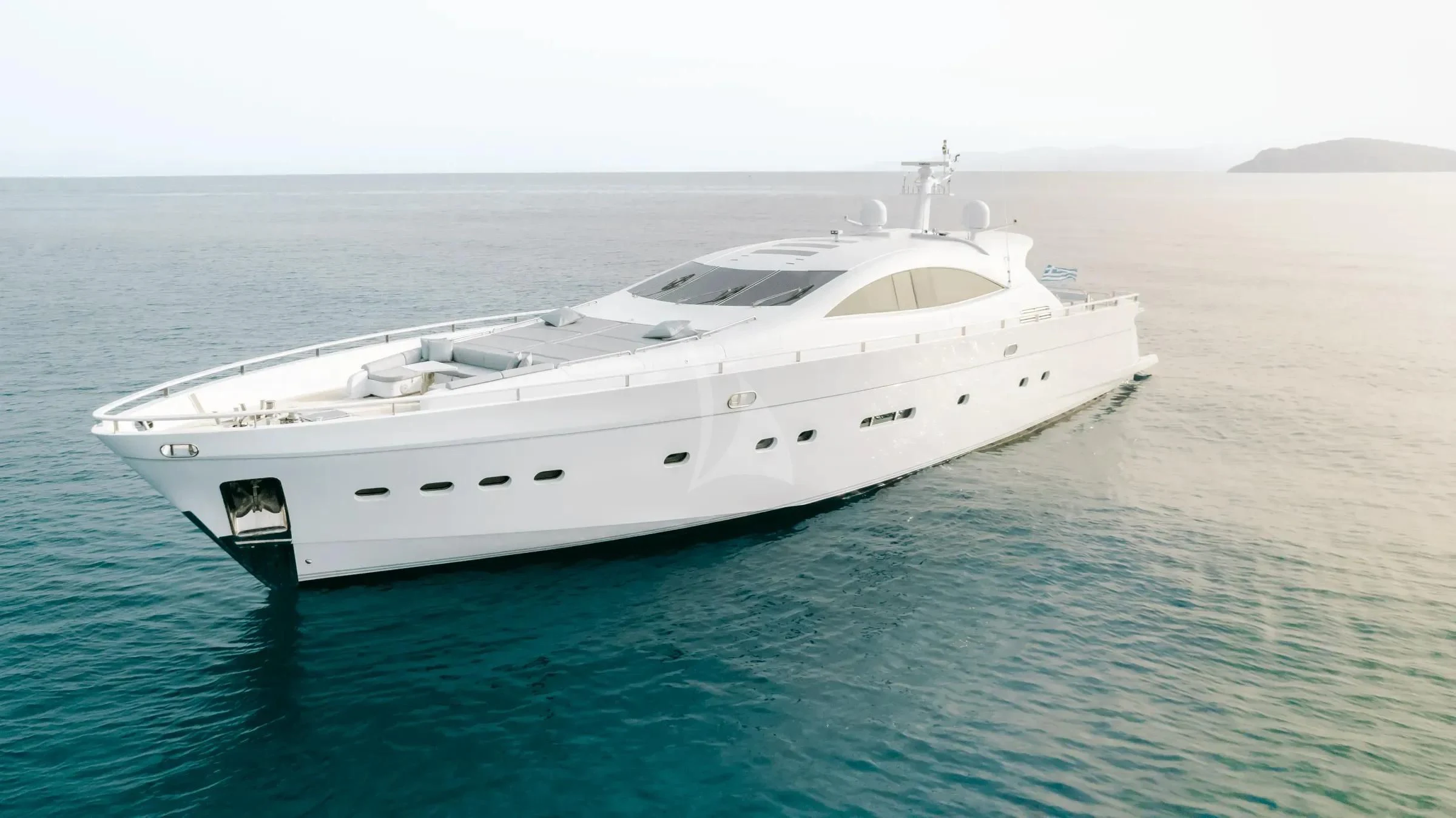 a white yacht in the water aboard MAC Yacht for Sale