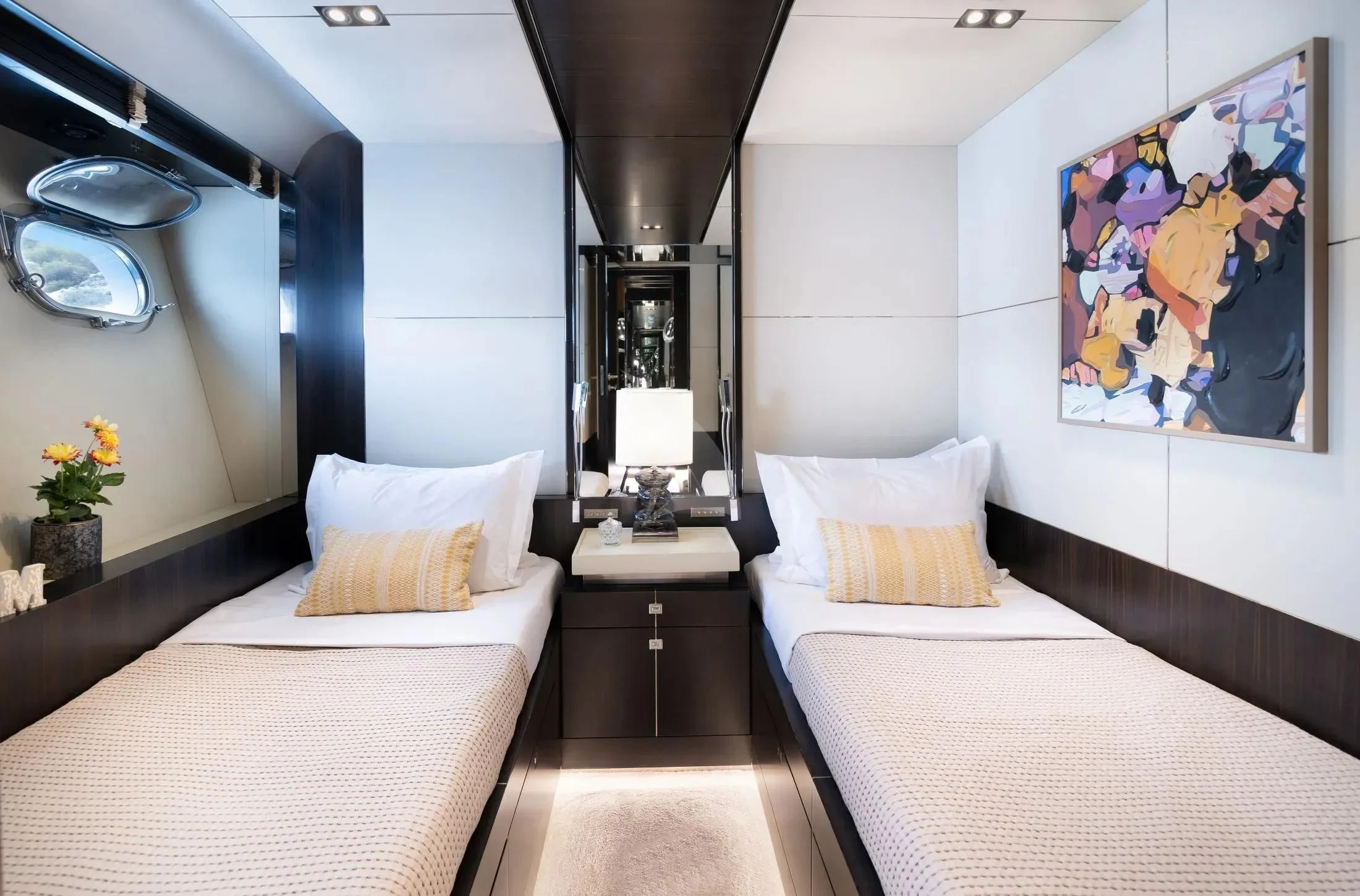 a room with two beds aboard MAC Yacht for Sale