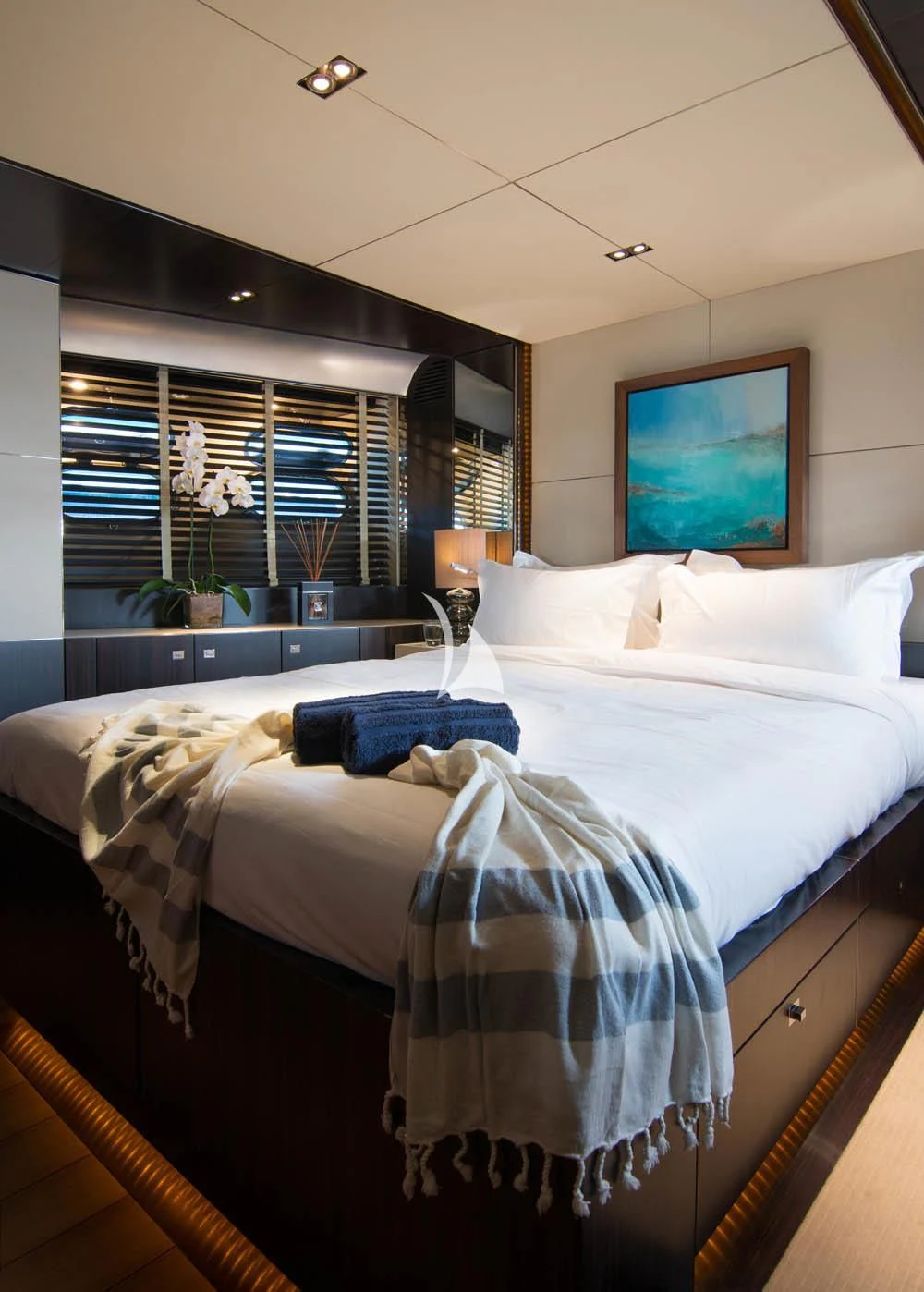 a couple of beds in a room aboard MAC Yacht for Sale