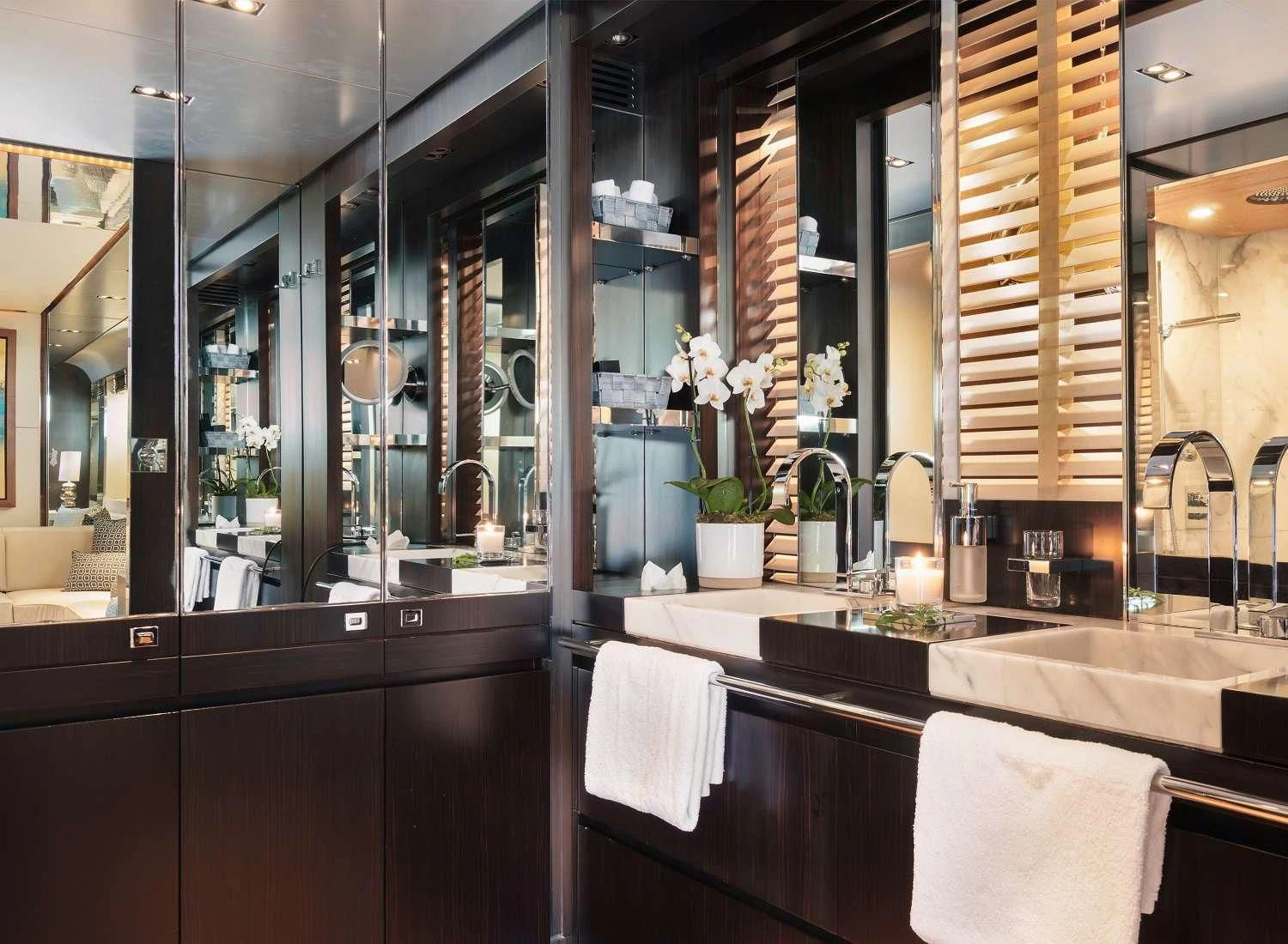 a bathroom with a large mirror aboard MAC Yacht for Sale